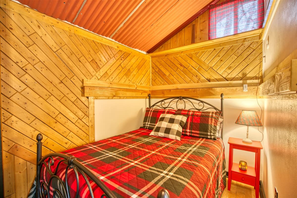 Full size bed with clean cozy linens line dried in the fresh mountain air.